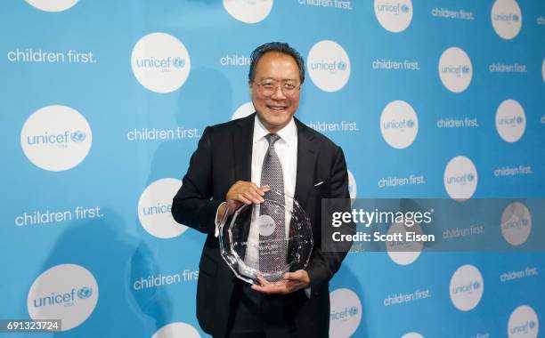 Honoree, Children's Champion Award UN Messenger of Peace, cellist Yo-Yo Ma poses with his award attends UNICEF Children's Champion Award Dinner...