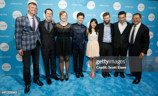 Members of the Silk Road Ensemble pose for a photo with Honoree, Children's Champion Award UN Messenger of Peace Cellist Yo-Yo Ma during UNICEF...