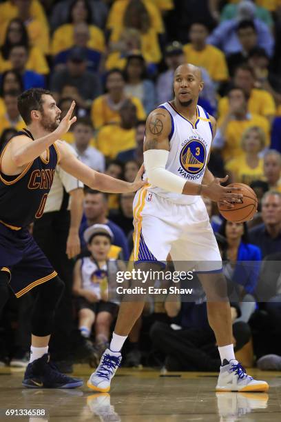 David West of the Golden State Warriors is defended by Kevin Love of the Cleveland Cavaliers during the first half of Game 1 of the 2017 NBA Finals...