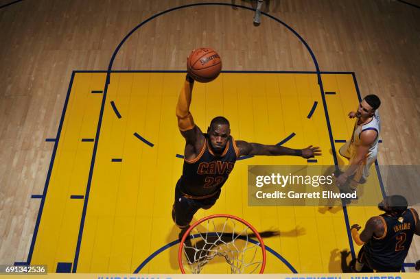 LeBron James of the Cleveland Cavaliers dunks against the Golden State Warriors in Game One of the 2017 NBA Finals on June 1, 2017 at Oracle Arena in...