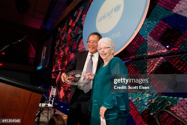 Children's Champion Award UN Messenger of Peace Recipient Cellist Yo-Yo Ma receives his award from presenter Joanne Rogers during UNICEF Children's...