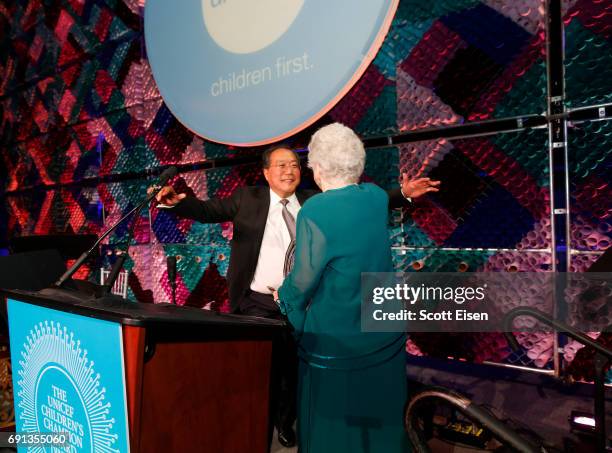 Children's Champion Award UN Messenger of Peace Recipient Cellist Yo-Yo Ma accepts his award from presenter Joanne Rogers during UNICEF Children's...