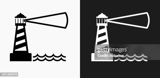 lighthouse icon on black and white vector backgrounds - lighthouse icon stock illustrations