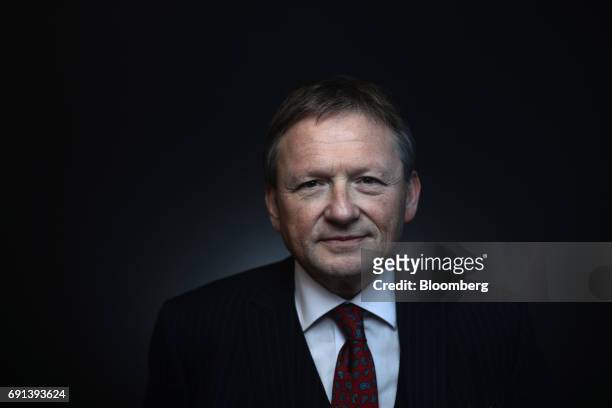 Boris Titov, the Kremlins business ombudsmen, poses for a photograph following a Bloomberg Television interview during the St. Petersburg...