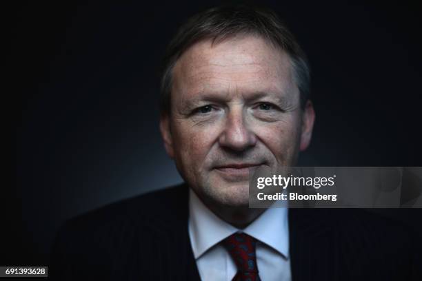 Boris Titov, the Kremlins business ombudsmen, poses for a photograph following a Bloomberg Television interview during the St. Petersburg...