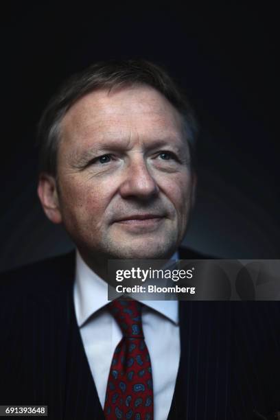 Boris Titov, the Kremlins business ombudsmen, poses for a photograph following a Bloomberg Television interview during the St. Petersburg...