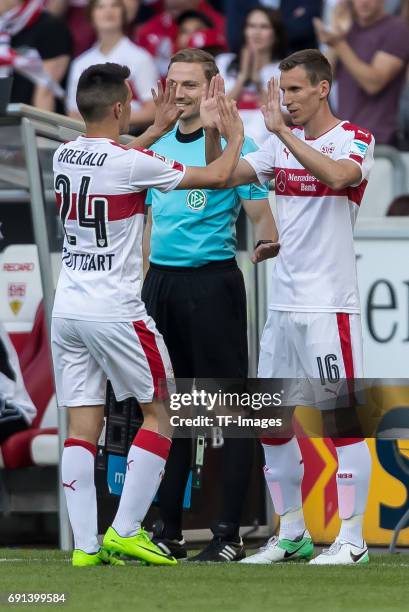 Josip Brekalo of Stuttgart shakes hands with Florian Klein of Stuttgart during the Second Bundesliga match between VfB Stuttgart and FC Wuerzburger...