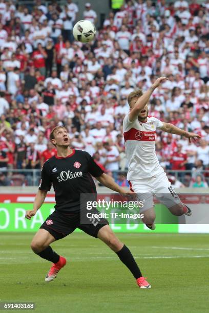 Tobias Schroeck of Wuerzburger Kickers and Alexandru Maxim of Stuttgart battle for the ball during the Second Bundesliga match between VfB Stuttgart...