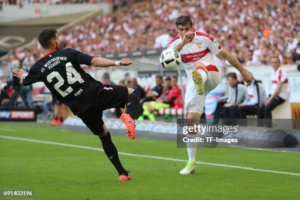 Valdet Rama of Wuerzburger Kickers and Emiliano Adrian Insua Zapata of Stuttgart battle for the ball during the Second Bundesliga match between VfB...