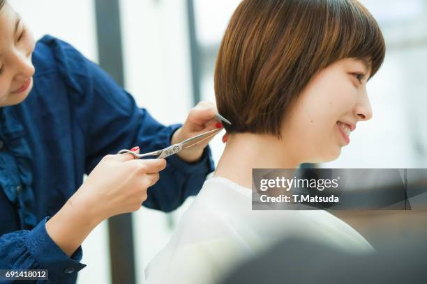 cut hair in mushroom style - mushroom haircut stock pictures, royalty-free photos & images