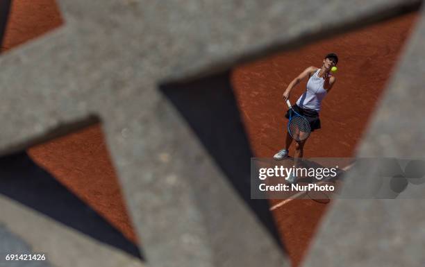 Tsvetana Pironkova of Bulgaria serves against Elina Svitolina of Ukraine during the second round at Roland Garros Grand Slam Tournament - Day 5 on...