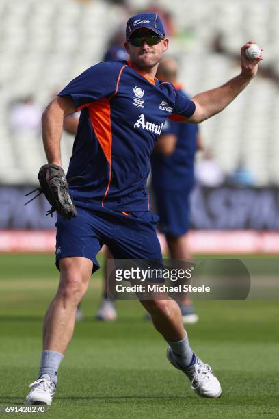 Corey Anderson of New Zealand warms up ahead of the ICC Champions Trophy match between Australia and New Zealand at Edgbaston on June 2, 2017 in...