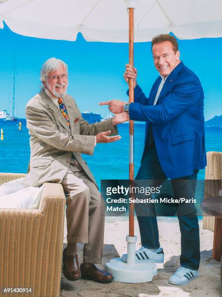 Actor Arnold Schwarzenegger with oceanographic explorer and environmental campaigner Jean Michel Cousteau are photographed for Paris Match on May 20,...