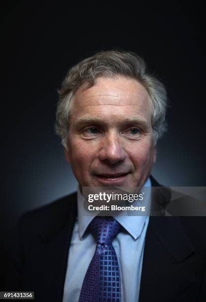 Jean Raby Natixis, chief executive officer of Global Asset Management LLC, poses for a photograph following a Bloomberg Television interview during...