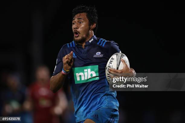 Melani Nanai of the Blues breaks away during the round 15 Super Rugby match between the Blues and the Reds at Apia Park National Stadium on June 2,...