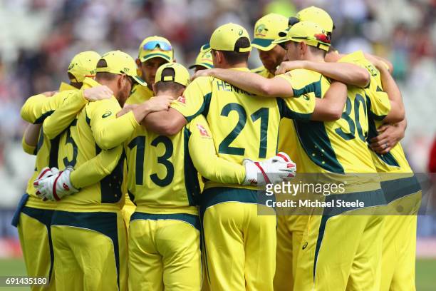 The Australia team huddle ahead of play during the ICC Champions Trophy match between Australia and New Zealand at Edgbaston on June 2, 2017 in...