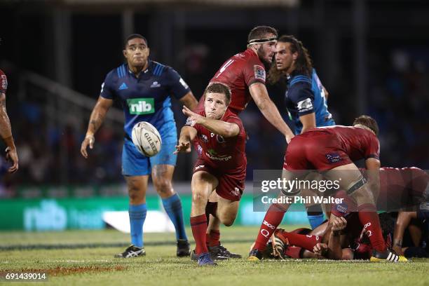 James Tuttle of the Reds clears the ball during the round 15 Super Rugby match between the Blues and the Reds at Apia Park National Stadium on June...
