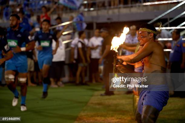 The Blues walk out onto the field during the round 15 Super Rugby match between the Blues and the Reds at Apia Park National Stadium on June 2, 2017...