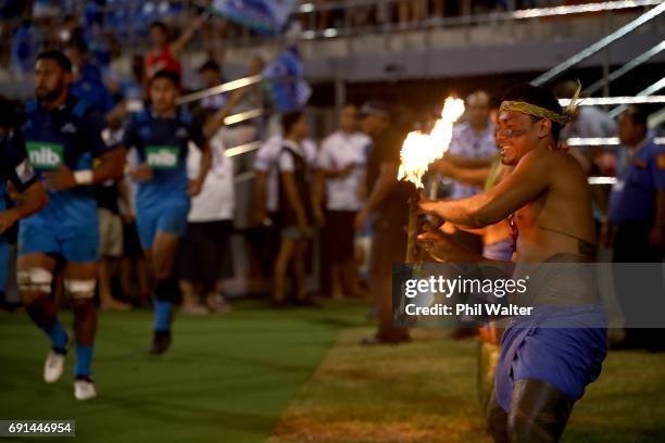 The Blues walk out onto the field during the round 15 Super Rugby match between the Blues and the Reds at Apia Park National Stadium on June 2, 2017...