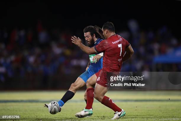 Rene Ranger of the Blues kicks ahead during the round 15 Super Rugby match between the Blues and the Reds at Apia Park National Stadium on June 2,...