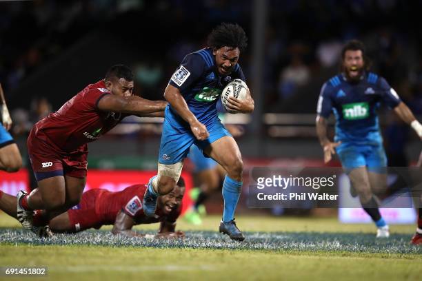 Faiane of the Blues makes a break during the round 15 Super Rugby match between the Blues and the Reds at Apia Park National Stadium on June 2, 2017...