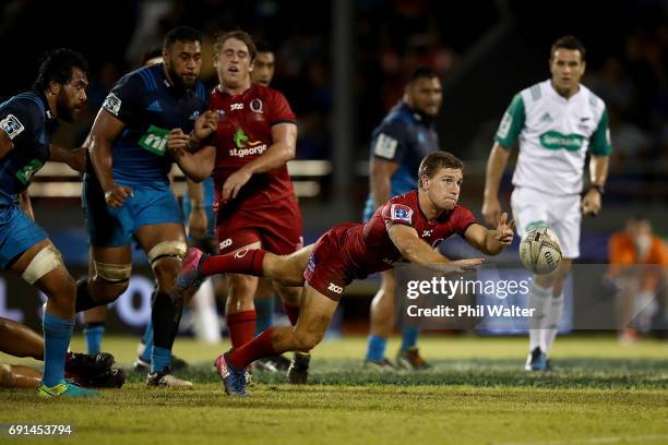 James Tuttle of the Reds clears the ball during the round 15 Super Rugby match between the Blues and the Reds at Apia Park National Stadium on June...
