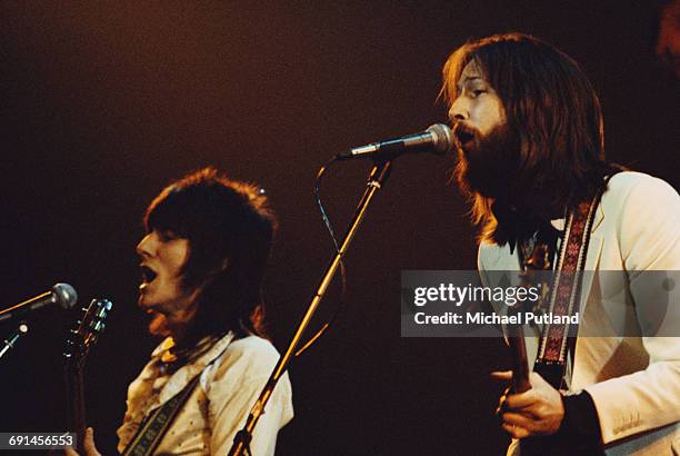 English guitarists Eric Clapton and Ronnie Wood performing with an all-star line-up at the Rainbow Theatre in London, 13th January 1973. The concert...