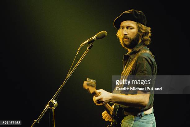 British guitarist Eric Clapton performing on stage during his US tour, July 1975.