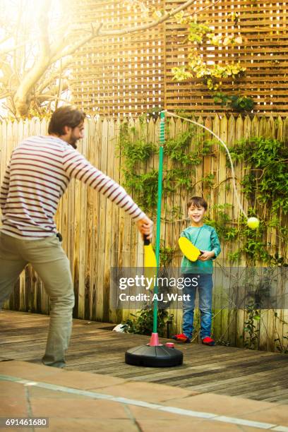 learning while he plays - tether ball stock pictures, royalty-free photos & images