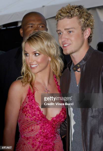 Singers Britney Spears and Justin Timberlake attend the 29th Annual American Music Awards at the Shrine Auditorium January 9, 2002 in Los Angeles, CA.