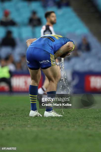 Tepai Moeroa of the Eels vomits after a heavy tackle during the round 13 NRL match between the Parramatta Eels and the New Zealand Warriors at ANZ...