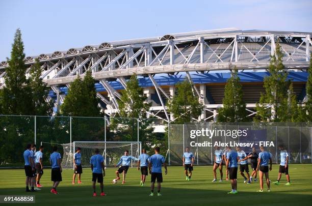 The players of Uruguay warm up during a training session in the shadow of the Daejeon World Cup Stadium during the FIFA U-20 World Cup on June 2,...