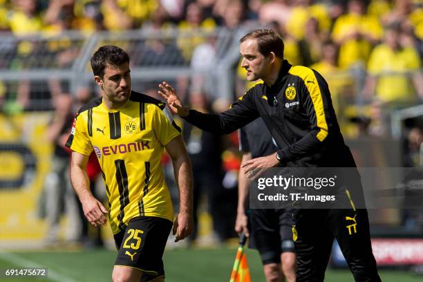 Sokratis of Dortmund speak with Head coach Thomas Tuchel of Dortmund during the Bundesliga match between Borussia Dortmund and TSG 1899 Hoffenheim at...