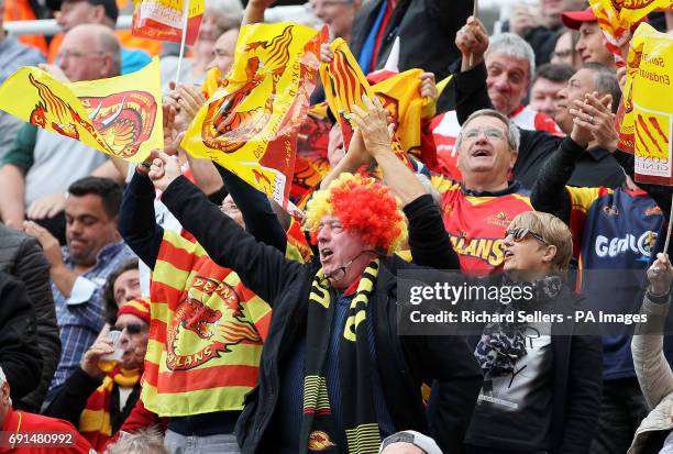 Catalans Dragons fans in the stands showing their support