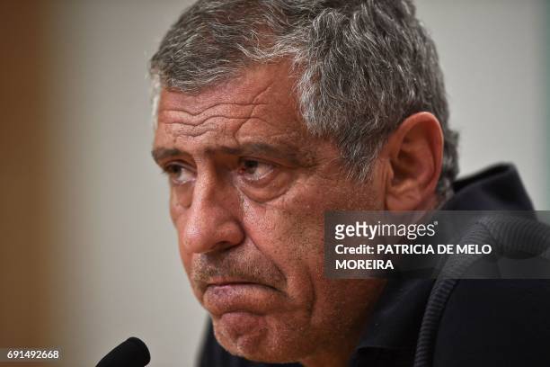 Portugal's head coach Fernando Santos grimaces during a press conference at "Cidade do Futebol" training camp in Oeiras, outskirts of Lisbon, on June...