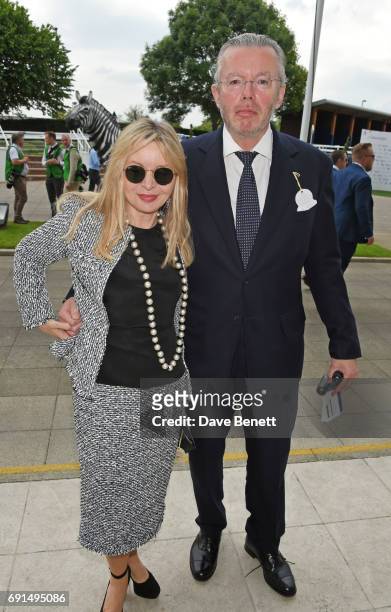 Hans Rausing and Julia Delves Broughton attend Ladies Day of the 2017 Investec Derby Festival at The Jockey Club's Epsom Downs Racecourse at Epsom...