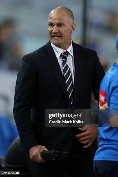 Eels coach Brad Arthur shouts as he watches on from the bench during the round 13 NRL match between the Parramatta Eels and the New Zealand Warriors...