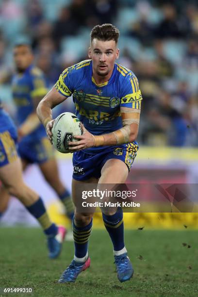 Clinton Gutherson of the Eels runs the ball during the round 13 NRL match between the Parramatta Eels and the New Zealand Warriors at ANZ Stadium on...