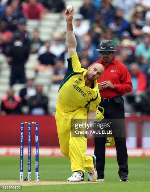 Australia's John Hastings bowls during the ICC Champions trophy cricket match between Australia and New Zealand at Edgbaston in Birmingham on June 2,...