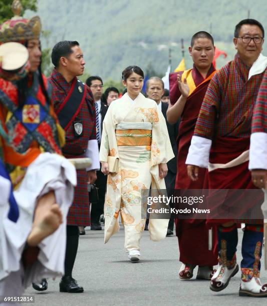 Princess Mako, the first grandchild of Japanese Emperor Akihito and Empress Michiko, heads to a meeting with Bhutan's King Jigme Khesar Namgyel...