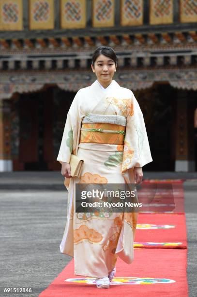 Princess Mako, the first grandchild of Japanese Emperor Akihito and Empress Michiko, heads to a meeting with Bhutan's King Jigme Khesar Namgyel...