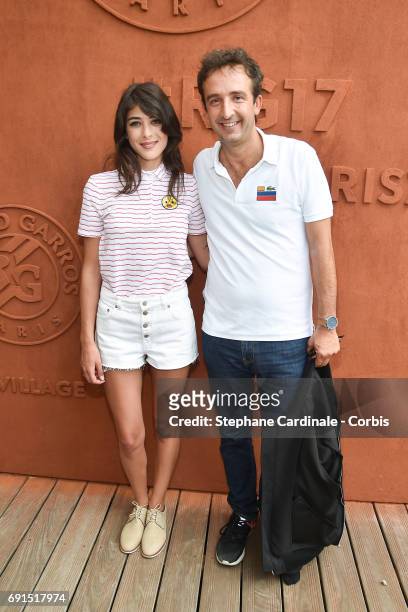 Cyrille Eldin and his companion Sandrine Calvayrac attend the 2017 French Tennis Open - Day Six at Roland Garros on June 2, 2017 in Paris, France.