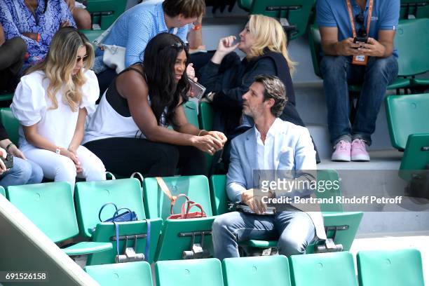 Serena Williams, pregnant, and French coach Patrick Mouratoglou attend Venus Williams match during the 2017 French Tennis Open - Day Four at Roland...