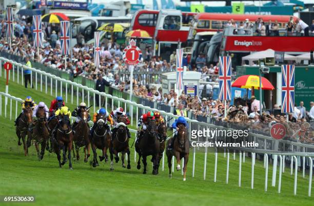 Chesterton ridden by William Buick wins the Investec Click & Invest Mile Handicap during the Investec Ladies Day at Epsom Downs Racecourse on June 2,...