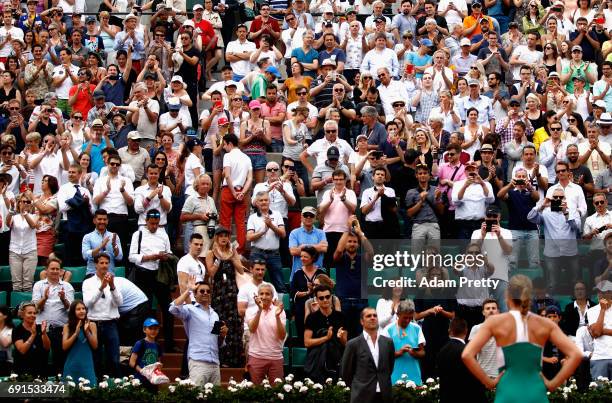 Kristina Mladenovic of France looks on to celebrates victory with the supporters following the lladies singles third round match against Shelby...