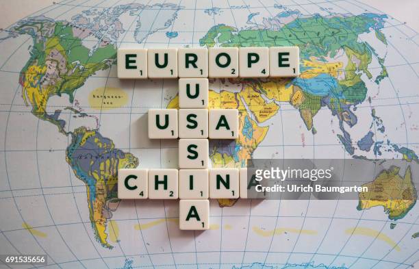 Symbol photo on the topics world policy, world trade, world economy, etc. The photo shows the words Russia, Europe, USA and China, composed of...