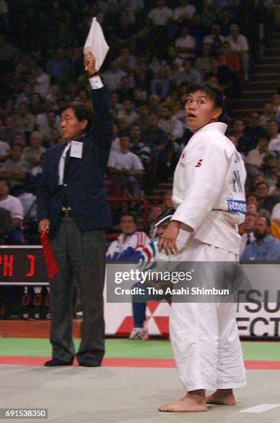 Hiroko Kitazume of Japan reacts after her defeat in the Women's -61kg second round against Severine Vandenhende of France during the World Judo...