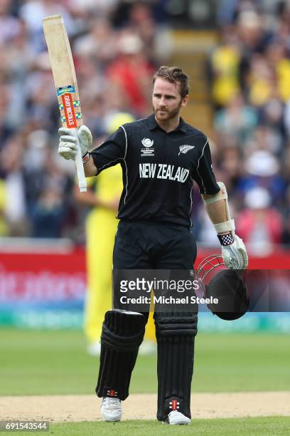 Kane Williamson of New Zealand acknowledges the crowds applause after reaching his century during the ICC Champions Trophy match between Australia...