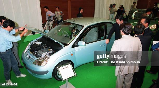 Toyota Motor Co's new hybrid Vehicle 'Prius' is is displayed during the unveiling press conference on October 14, 1997 in Nagoya, Aichi, Japan.