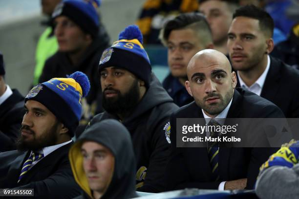Injured Eels player Tim Mannah watches on from the stands during the round 13 NRL match between the Parramatta Eels and the New Zealand Warriors at...